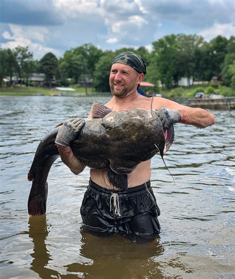 We Caught a GIANT! Noodling and Hand Fishing Flathead Catfish.